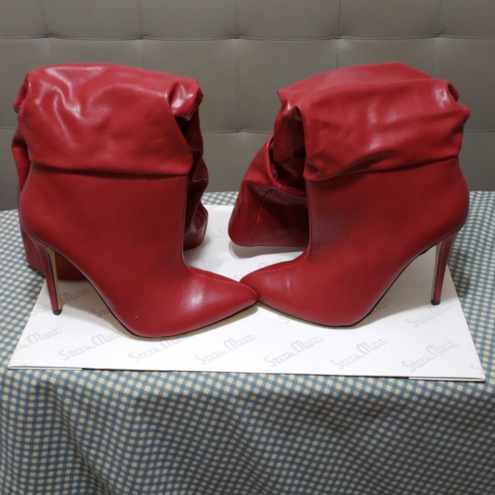 Red knee high boots. Worn only to try on